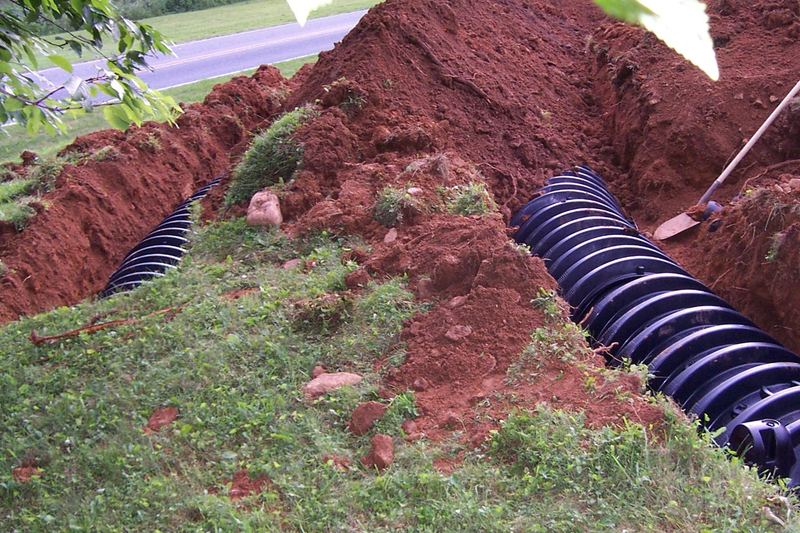 Leaching chambers laid in a red clay trench