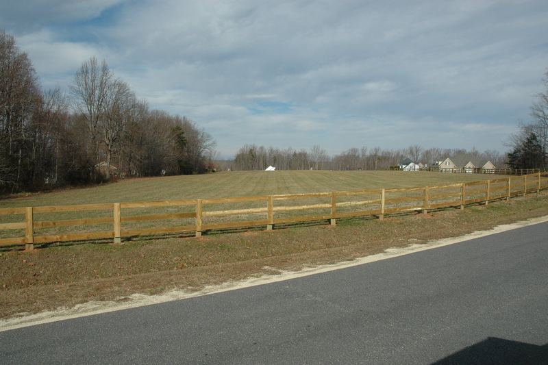 Open field beside a road used as an off-site drain field